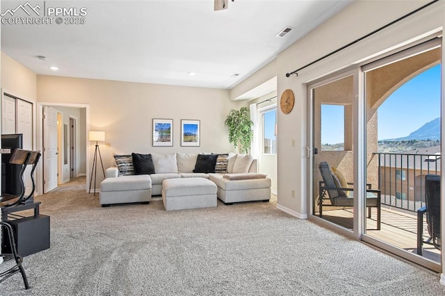 1530 Little Bear Creek Pt Unit 302, Colorado Springs, CO 80904 - living room with carpet floors, baseboards, recessed lighting, and visible vents