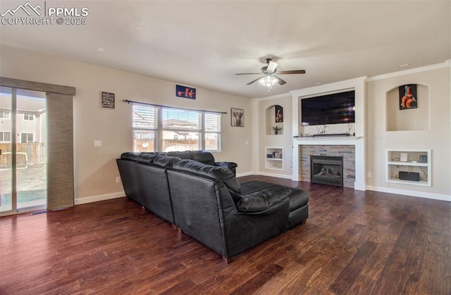 10585 Abrams Dr, Colorado Springs, CO 80925 - living area featuring baseboards, a ceiling fan, plenty of natural light, and wood finished floors