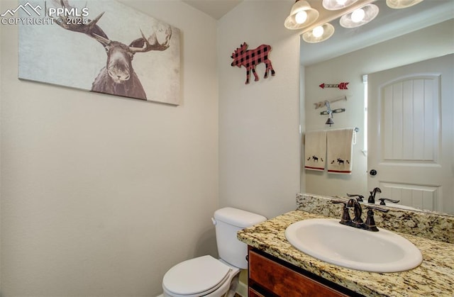 10585 Abrams Dr, Colorado Springs, CO 80925 - bathroom with vanity and toilet