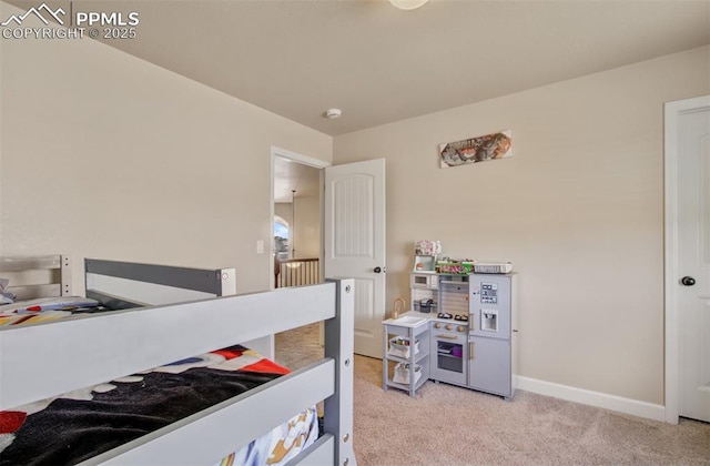 10585 Abrams Dr, Colorado Springs, CO 80925 - bedroom featuring light carpet and baseboards