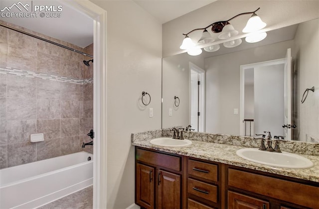 10585 Abrams Dr, Colorado Springs, CO 80925 - full bathroom with washtub / shower combination, double vanity, and a sink