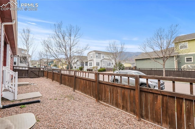 147 Celestine St, Colorado Springs, CO 80905 - view of yard featuring a fenced backyard and a residential view