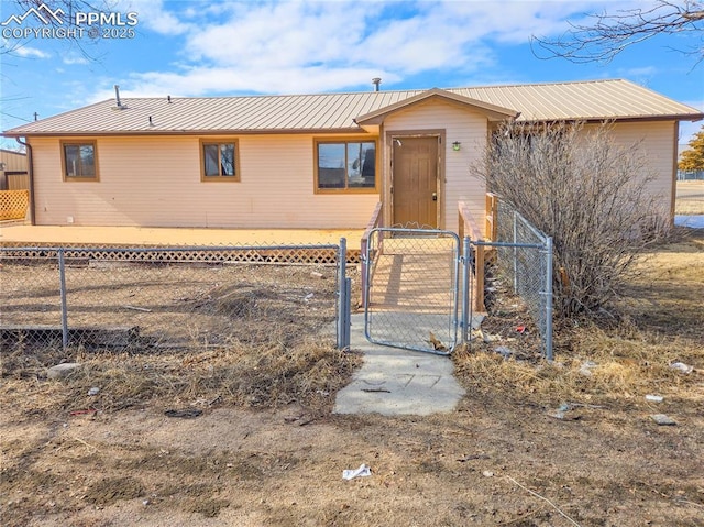 722 6th St, Hugo, CO 80821 - ranch-style house featuring a gate and metal roof