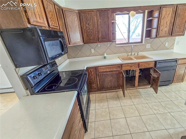 722 6th St, Hugo, CO 80821 - kitchen featuring black appliances, a sink, open shelves, decorative backsplash, and light tile patterned flooring