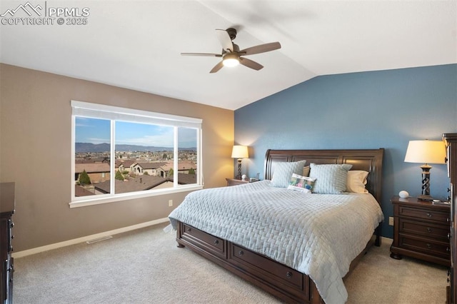 bedroom with ceiling fan, light carpet, visible vents, baseboards, and vaulted ceiling