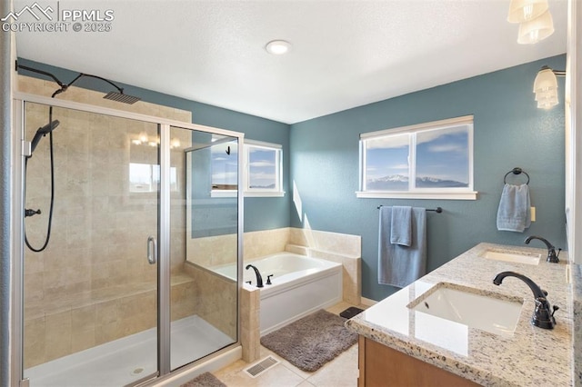 full bath with a garden tub, a sink, and a stall shower