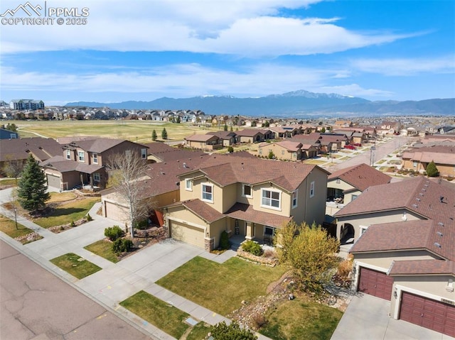 birds eye view of property featuring a residential view and a mountain view