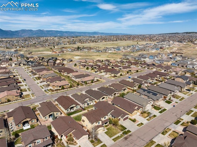 aerial view featuring a residential view and a mountain view