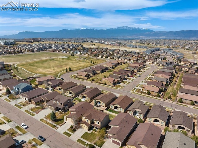 bird's eye view featuring a mountain view and a residential view