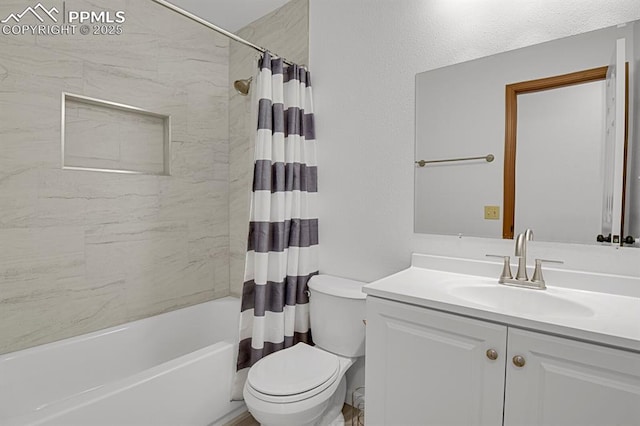 bathroom featuring toilet, vanity, and shower / tub combo with curtain