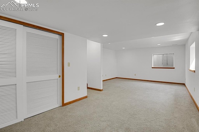 interior space featuring recessed lighting, carpet flooring, and baseboards