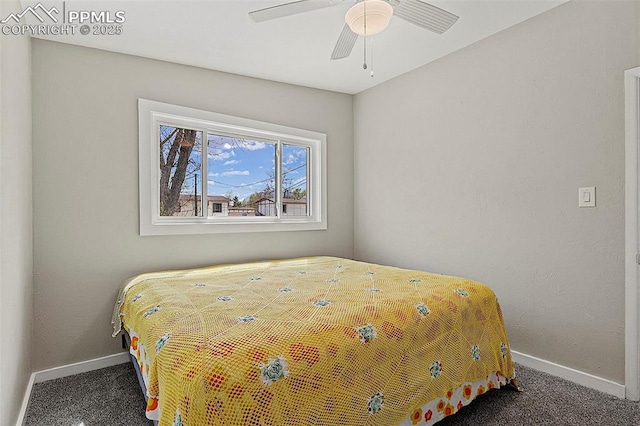 bedroom featuring baseboards and carpet flooring