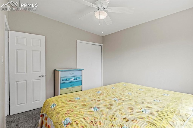 carpeted bedroom with a closet and ceiling fan