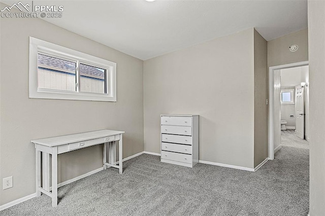 unfurnished office with carpet floors and a wealth of natural light