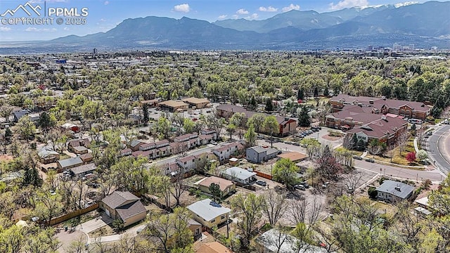 drone / aerial view featuring a residential view and a mountain view