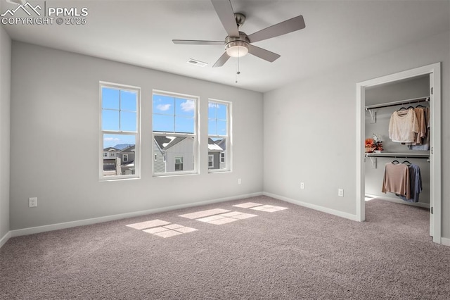 6375 Laud Pt, Colorado Springs, CO 80924 - unfurnished bedroom with baseboards, a spacious closet, visible vents, and carpet floors