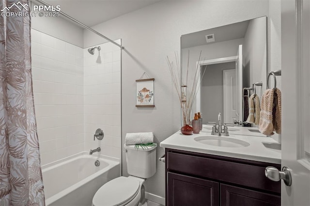 6375 Laud Pt, Colorado Springs, CO 80924 - full bathroom with toilet, visible vents, vanity, and shower / tub combo with curtain