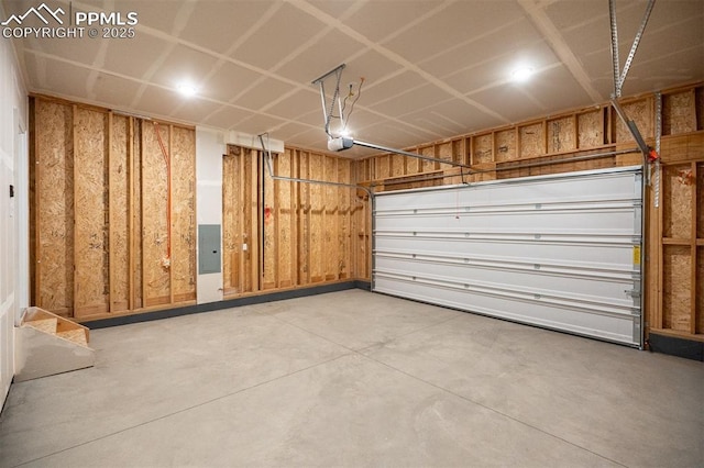 6375 Laud Pt, Colorado Springs, CO 80924 - garage with a garage door opener and electric panel