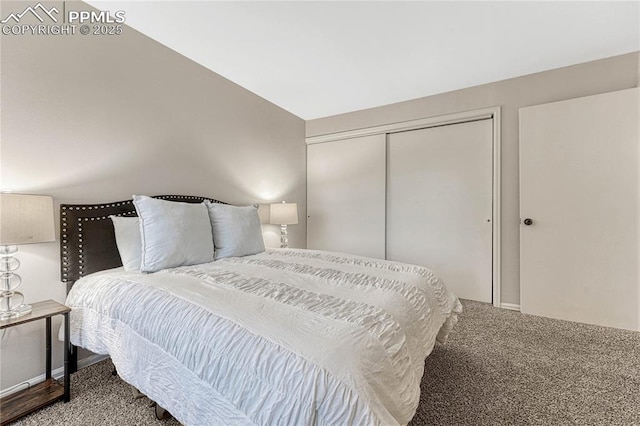 carpeted bedroom featuring a closet