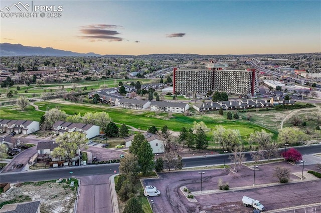 aerial view at dusk with a mountain view