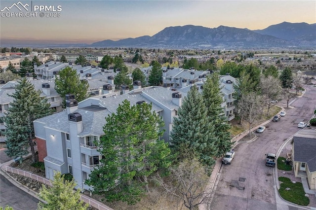 bird's eye view featuring a residential view and a mountain view