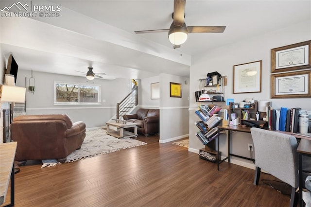 office with wood finished floors, a ceiling fan, and baseboards