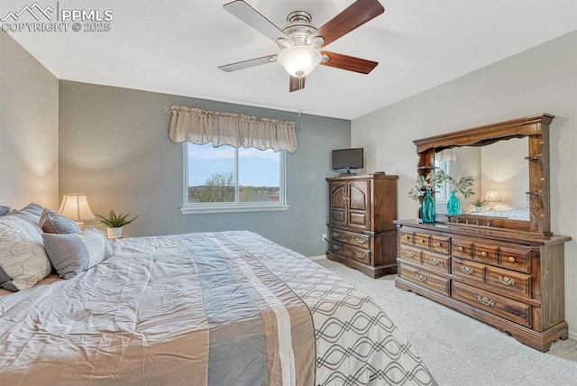 bedroom with carpet flooring, ceiling fan, and baseboards