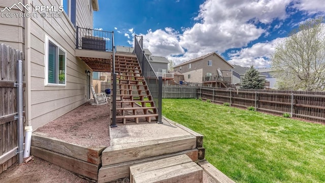 view of yard featuring stairway