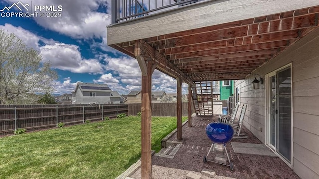 view of yard featuring stairs, a patio area, and a balcony