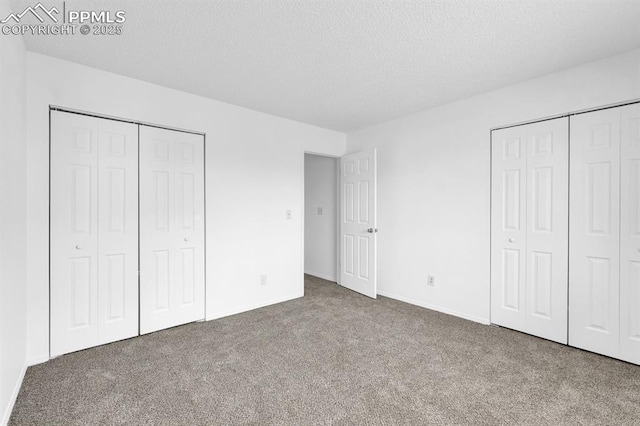 1287 Soaring Eagle Dr, Colorado Springs, CO 80915 - unfurnished bedroom featuring baseboards, carpet floors, and a textured ceiling