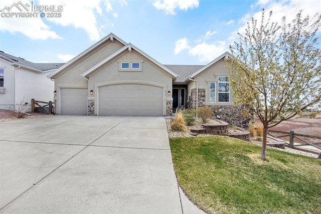 8421 Crooked Branch Ln, Colorado Springs, CO 80927 - ranch-style home featuring fence, an attached garage, stone siding, stucco siding, and driveway