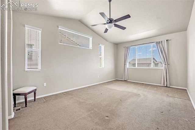 8421 Crooked Branch Ln, Colorado Springs, CO 80927 - empty room featuring carpet flooring, ceiling fan, vaulted ceiling, and baseboards