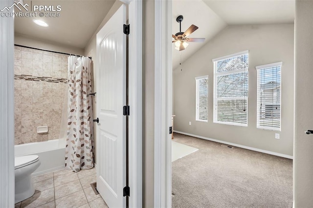 8421 Crooked Branch Ln, Colorado Springs, CO 80927 - bathroom with ceiling fan, visible vents, tile patterned flooring, vaulted ceiling, and shower / bath combo with shower curtain