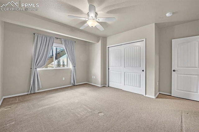 8421 Crooked Branch Ln, Colorado Springs, CO 80927 - unfurnished bedroom with a closet, carpet flooring, baseboards, and a ceiling fan