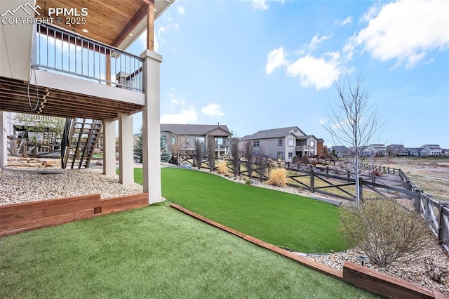 8421 Crooked Branch Ln, Colorado Springs, CO 80927 - view of yard with fence, a residential view, and stairs