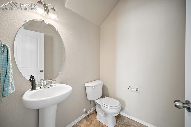 2404 Obsidian Forest Vw, Colorado Springs, CO 80951 - bathroom with toilet and baseboards