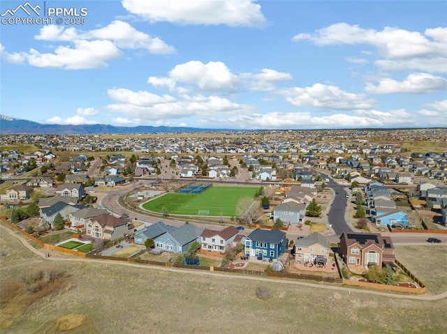 aerial view with a mountain view and a residential view
