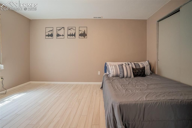 270 Wallace St, Colorado Springs, CO 80911 - bedroom featuring visible vents, baseboards, and wood finished floors