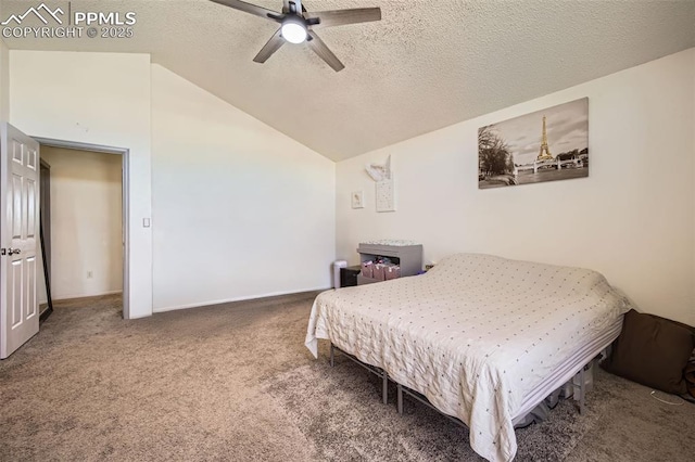 bedroom with a ceiling fan, a textured ceiling, vaulted ceiling, carpet floors, and baseboards