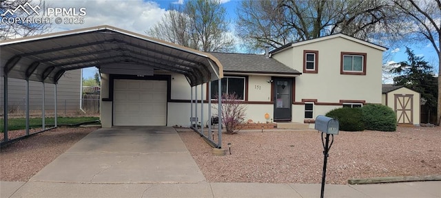 split level home with a storage unit, a carport, concrete driveway, and stucco siding