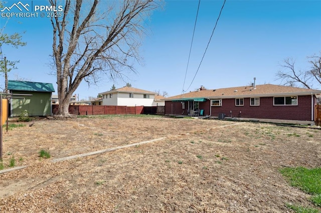 view of yard with fence