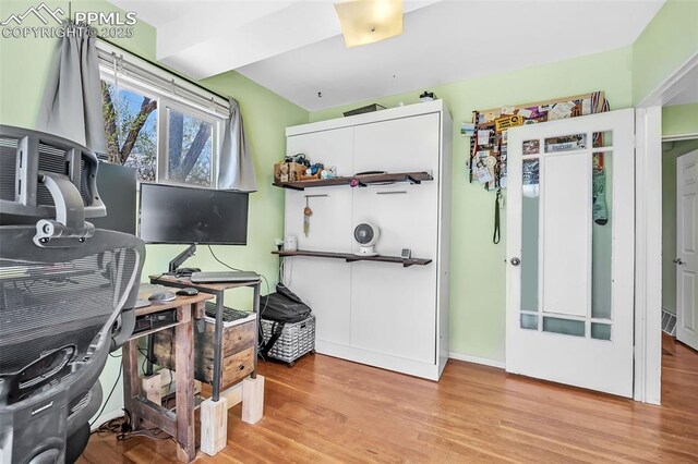 627 E Las Animas St, Colorado Springs, CO 80903 - home office featuring light wood-style flooring