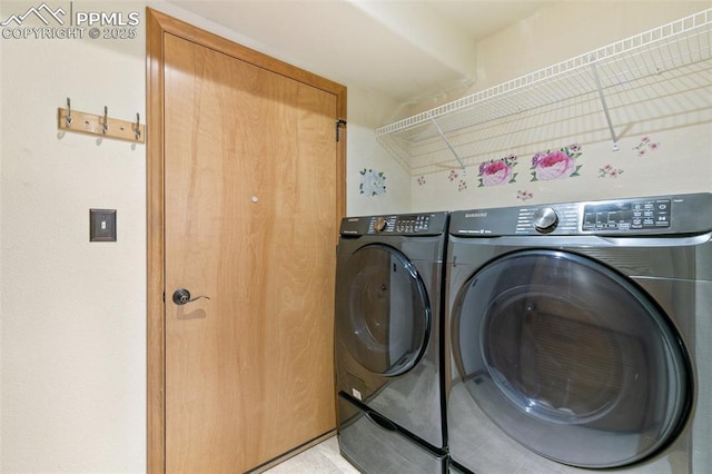 11960 S Conestoga Trl, Elbert, CO 80106 - laundry area featuring washing machine and clothes dryer