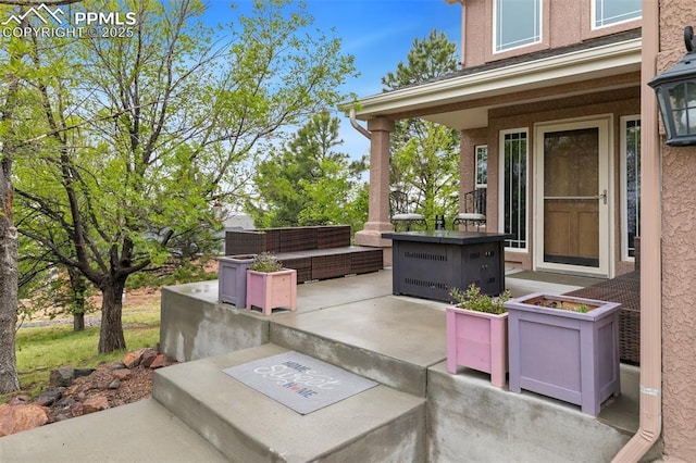 11960 S Conestoga Trl, Elbert, CO 80106 - view of patio with an outdoor living space