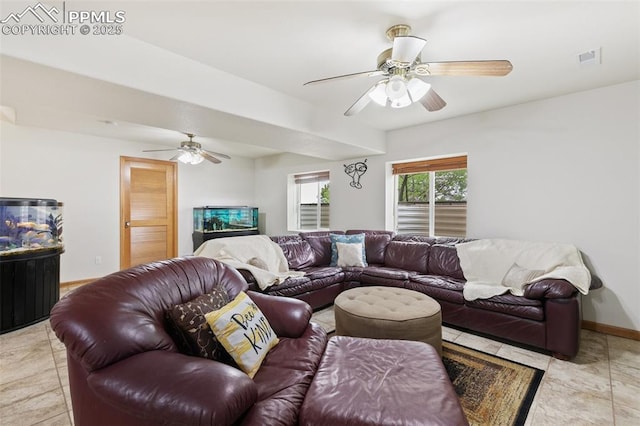 11960 S Conestoga Trl, Elbert, CO 80106 - living room with ceiling fan and baseboards