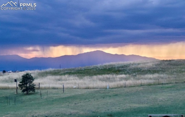 11960 S Conestoga Trl, Elbert, CO 80106 - view of mountain backdrop with rural landscape