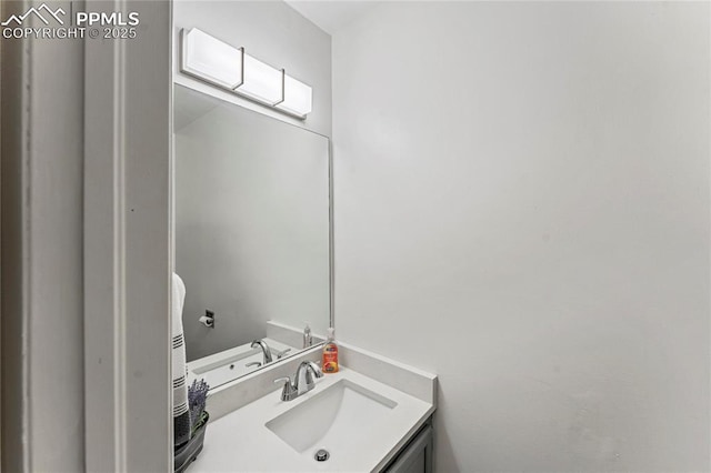 half bath featuring vanity