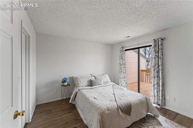 bedroom with baseboards, wood finished floors, access to outside, and a textured ceiling
