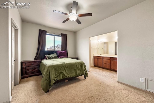 11584 Louvre Pt, Peyton, CO 80831 - bedroom featuring ceiling fan, baseboards, light colored carpet, and ensuite bath