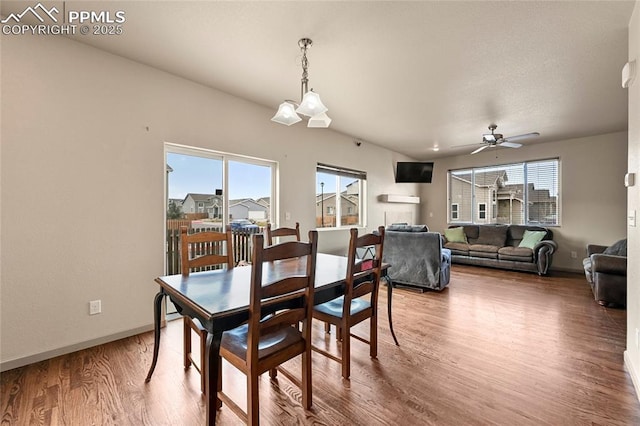 11584 Louvre Pt, Peyton, CO 80831 - dining room with a ceiling fan, a wealth of natural light, wood finished floors, and baseboards